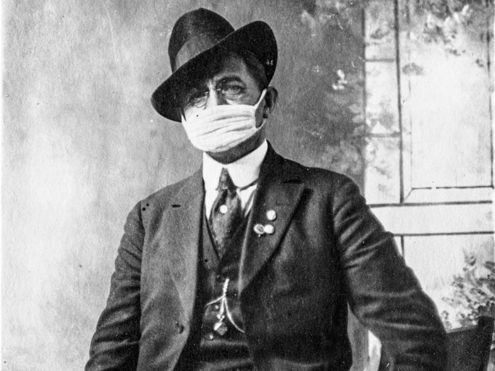 Как в 1918 году заставляли носить маски